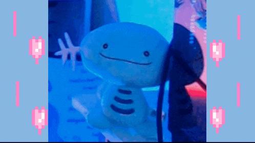 a pixelated image of a stuffed animal with a smiley face