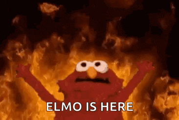 elmo from sesame street is on fire with his arms outstretched and says `` elmo is here '' .