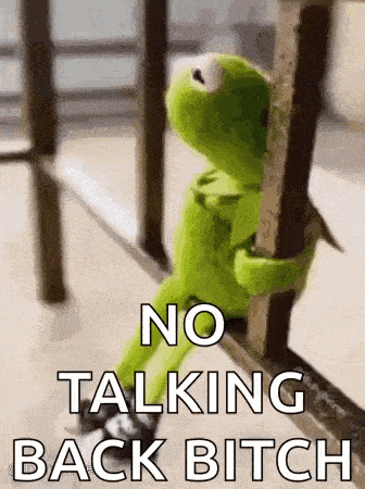 kermit the frog is sitting on a railing and holding onto a railing .