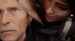 a close up of a man and a woman 's faces in a video game .