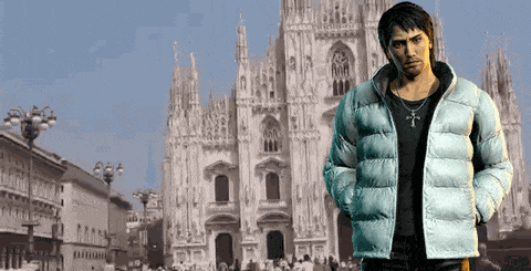 a man in a white jacket stands in front of a building