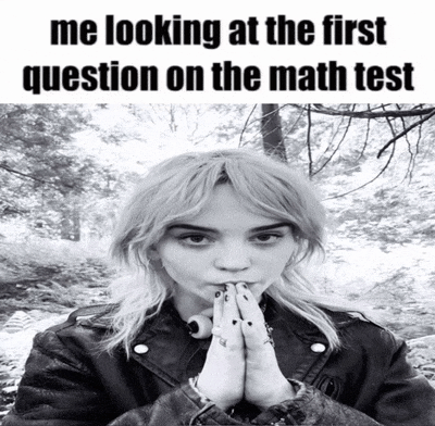 a black and white photo of a girl with the words me looking at the first question on the math test