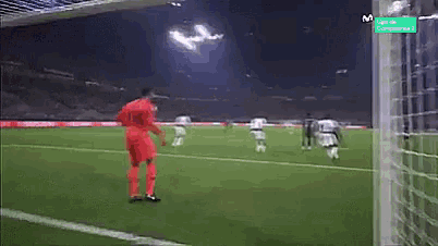 a soccer game is being played on a tv screen