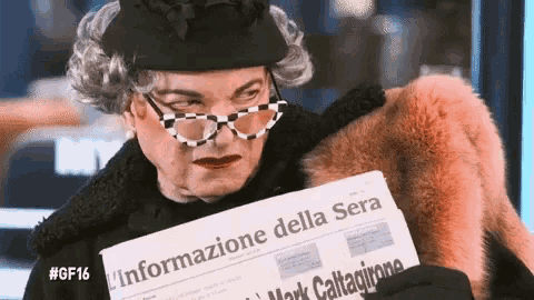 a woman holding a newspaper that says " l' informazione della sera " on it