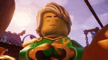 a close up of a lego character with his eyes closed and a sword in his hands