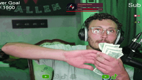a man wearing glasses and headphones holds a bunch of money in front of a sign that says allen