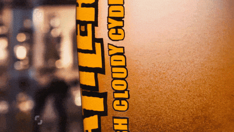 a close up of a bottle of beer that says " cloudy eyed " on it