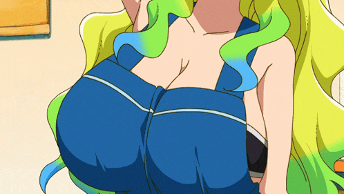 a close up of a woman 's breasts in a blue tank top