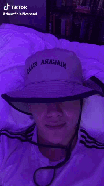 a man wearing a hat that says ' i am a russian '