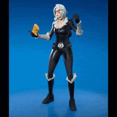 a woman in a black and white superhero costume is holding a banana