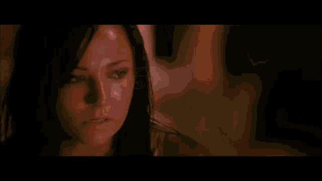 a woman with a flame coming out of her face