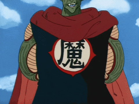 a cartoon character is wearing a red cape with chinese characters on it