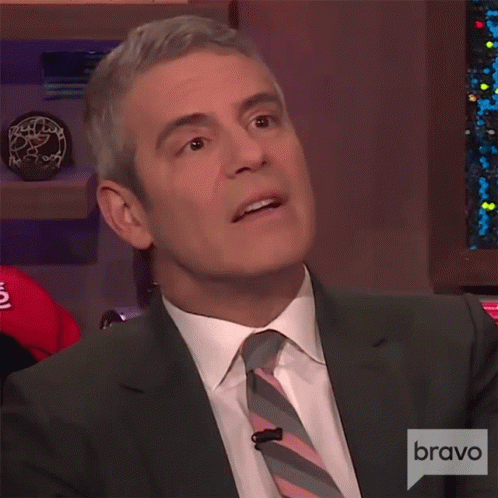 Look Down Andy Cohen GIF - Look Down Andy Cohen Watch What Happens Live GIFs