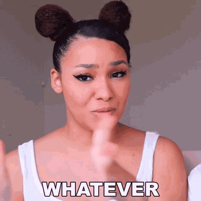 a woman with two buns on her head says " whatever "