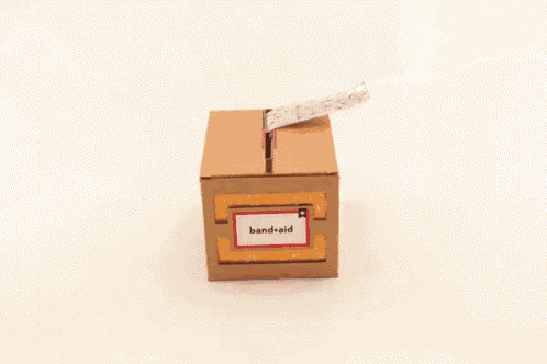 a cardboard box has a label that says band-aid on it