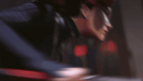 a person wearing red ear muffs is standing in a room