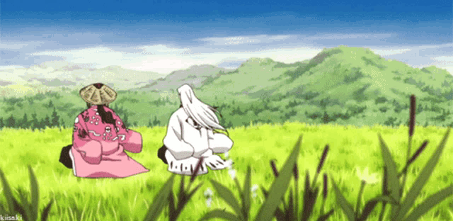 a couple of anime characters sitting in a grassy field with kiis.ki written on the bottom right