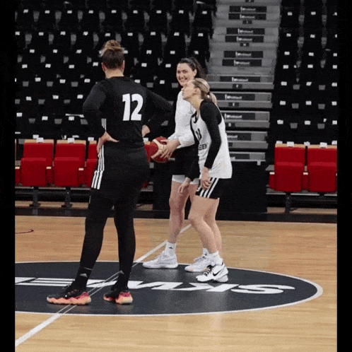 a basketball player with the number 12 on her back