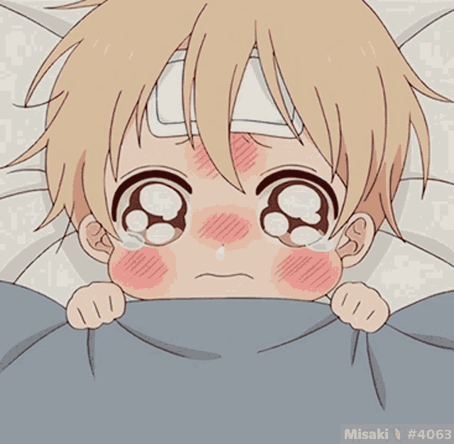 a baby with a bandage on his forehead is crying