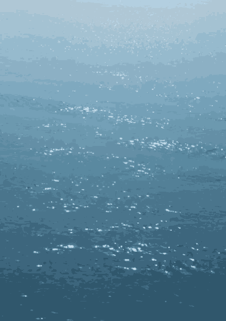 a close up of a blue water surface