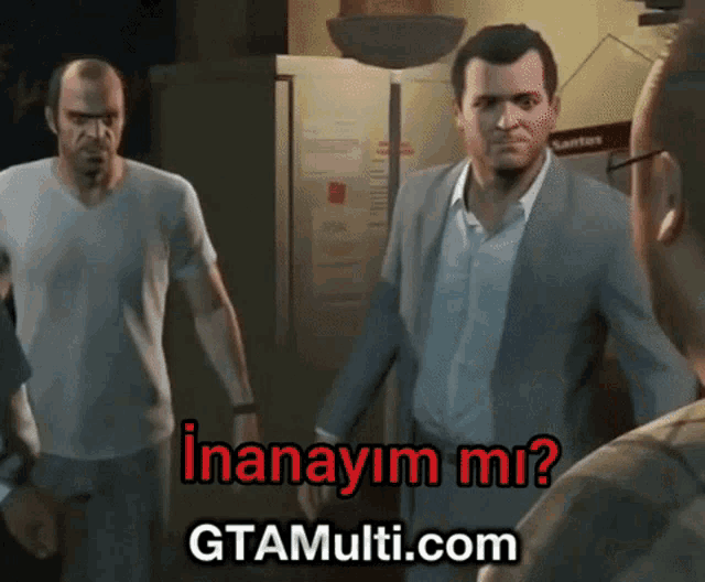 a man in a suit stands next to a man in a white shirt with the words inanayim mi on the bottom