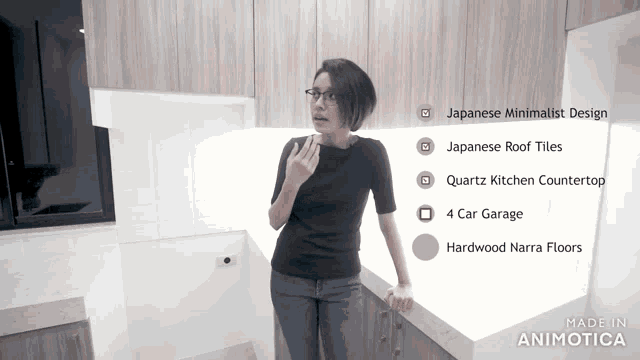 a woman standing in a kitchen with japanese minimalist design written on it