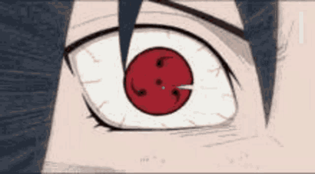a close up of a person 's eye with a red pupil and a white eye .