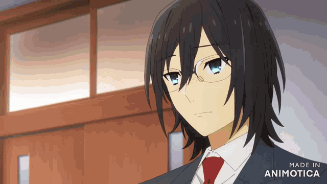 a man with glasses and a red tie is made in animatica