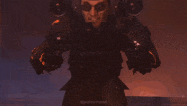 a man in a gas mask is holding a gun in front of him