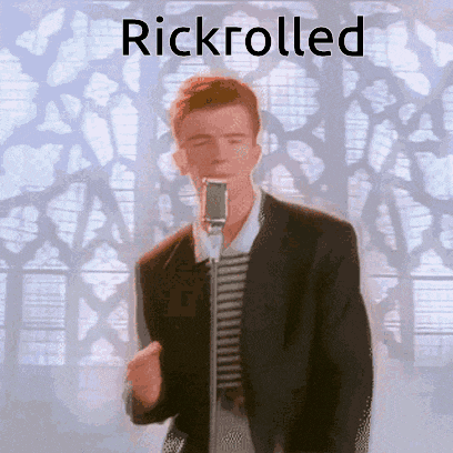 a man in a suit is singing into a microphone with the word rickrolled written above him