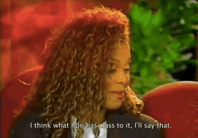 a woman with curly hair is saying i think what i do has class to it