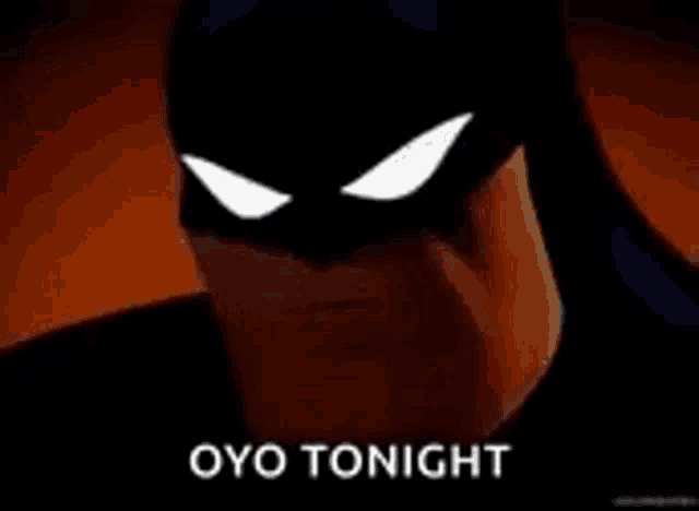 a close up of a cartoon character wearing a batman mask with the words `` oyo tonight '' .