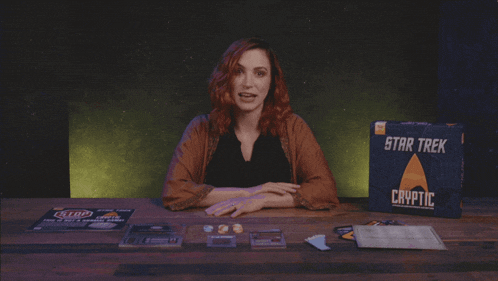 a woman says we don 't wanna cheat in front of a star trek game