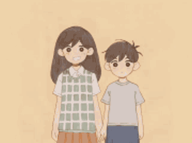 a group of children standing next to each other holding hands .