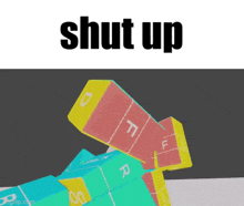 a picture of a cube with the words shut up on it
