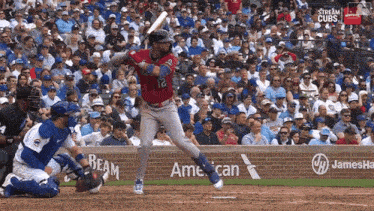 a baseball player with the number 12 on the back of his jersey