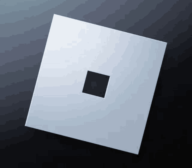 a white square with a small black square in the middle