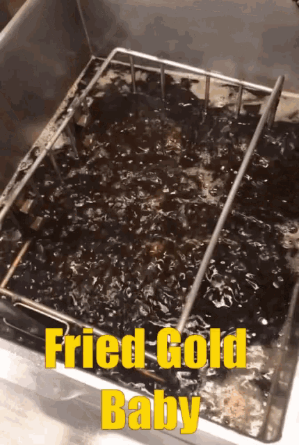 a fryer with the words " fried gold baby " on it