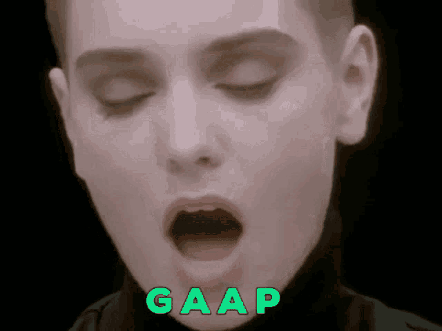 a close up of a woman 's face with the word gaap on the bottom