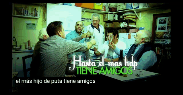 a group of men are sitting around a table with the words hasta el mas hap tiene amigos on the bottom