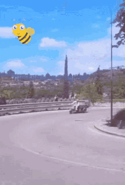 a cartoon bee is flying over a motorcycle on a street