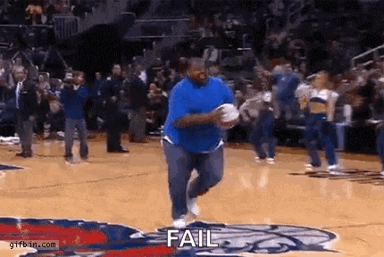 a man in a blue shirt is running on a basketball court with the word fail written on it .