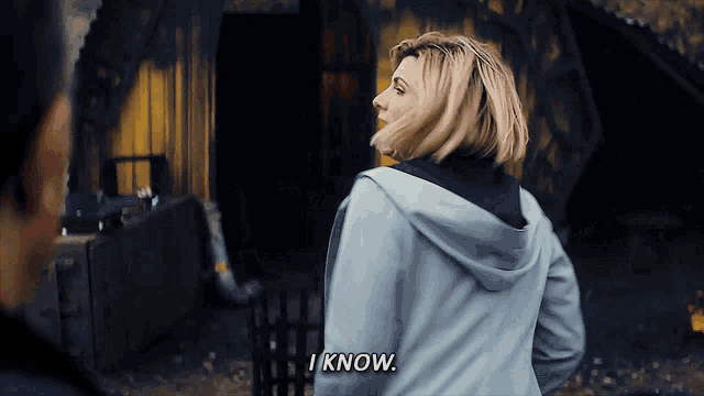 a woman says " i know " while standing next to a man