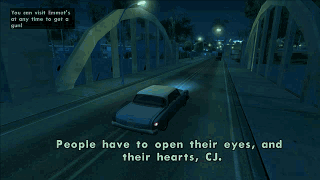 a blue car is driving down a street with the words people have to open their eyes and their hearts
