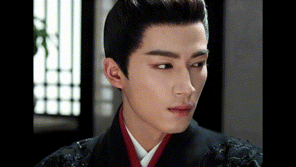 a close up of a man 's face wearing a traditional costume and a red collar .