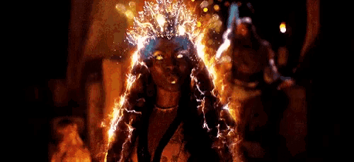a woman with a crown of fire on her head
