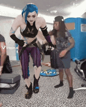 a woman with blue hair is standing in front of a man with long hair