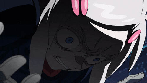 a close up of a cartoon character 's face with the letter n on her head
