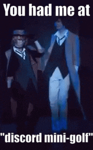 a couple of men standing next to each other on a stage with the caption `` you had me at discord mini-golf '' .