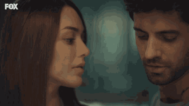 a man and a woman are looking at each other and the fox logo is visible